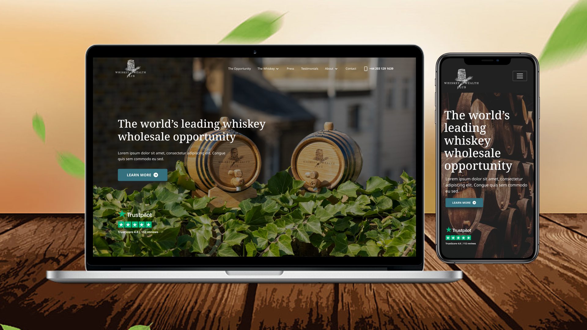 whiskey and wealth club website design on multiple devices